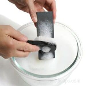 clean a sharpening stone with warm soapy water