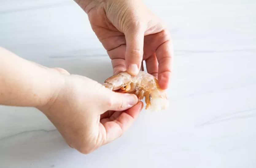 How to devein shrimp without peeling?