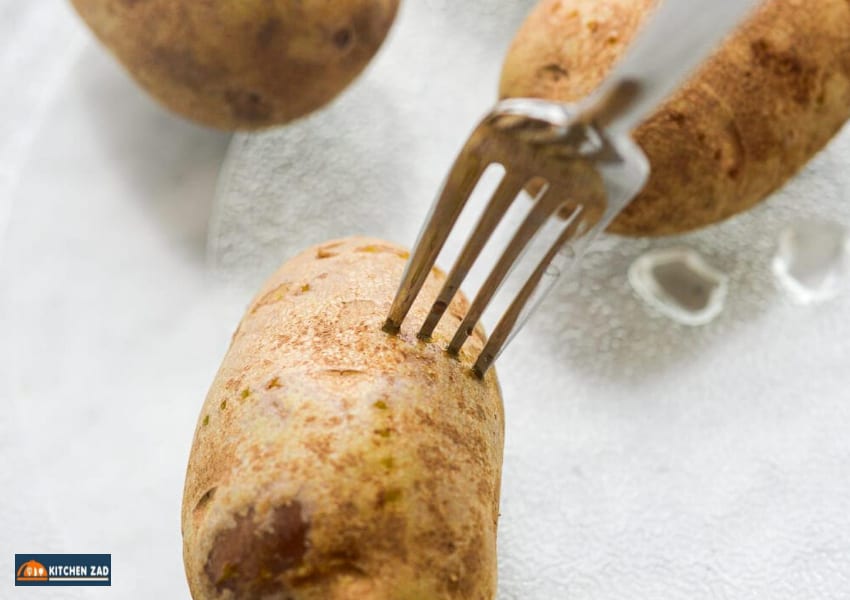 Poke the potatoes with a fork